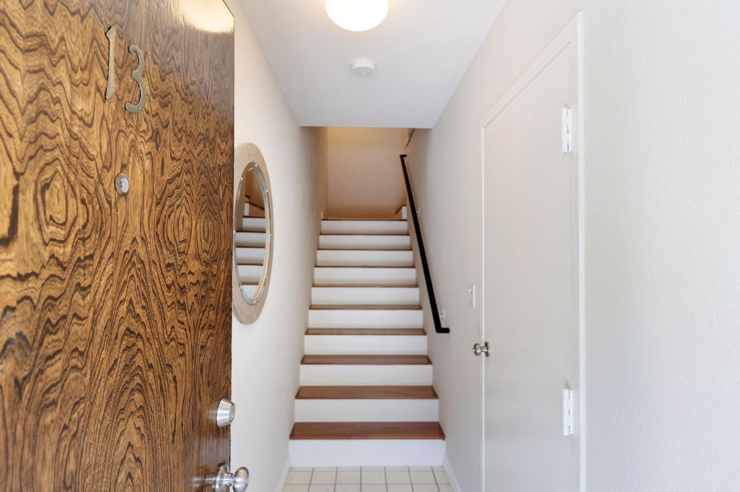 33 Park Road, Unit 13 Burlingame, CA 94010 - Photo 5 of 43 a view of entryway with stairs and white walls
