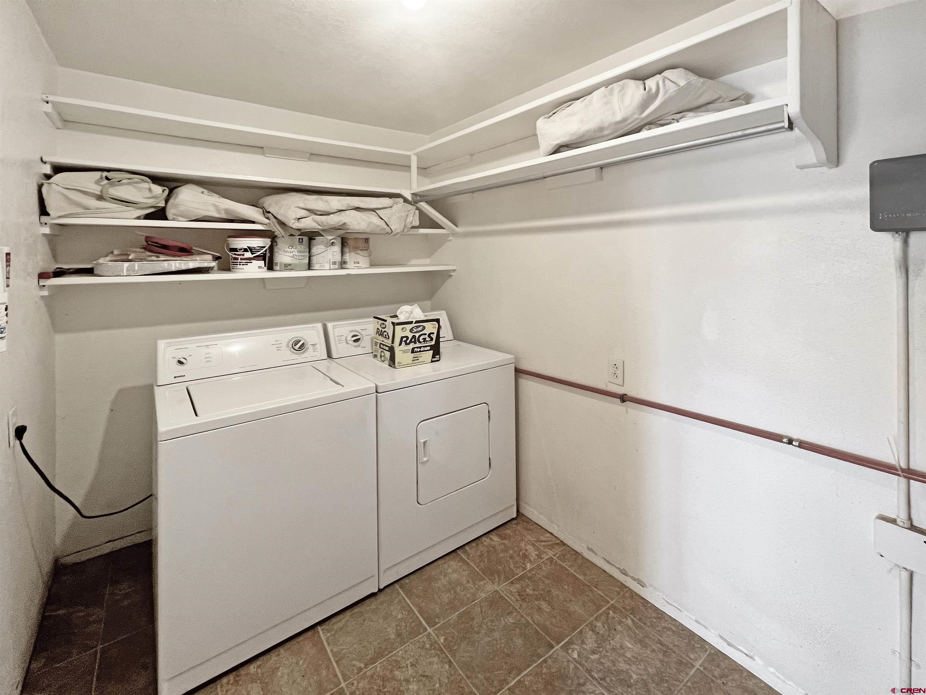 112 North Adams Street Cortez, CO 81321 - Photo 15 of 20 a utility room with dryer and washer