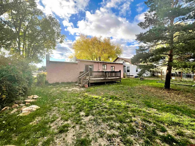 a house view with a garden space