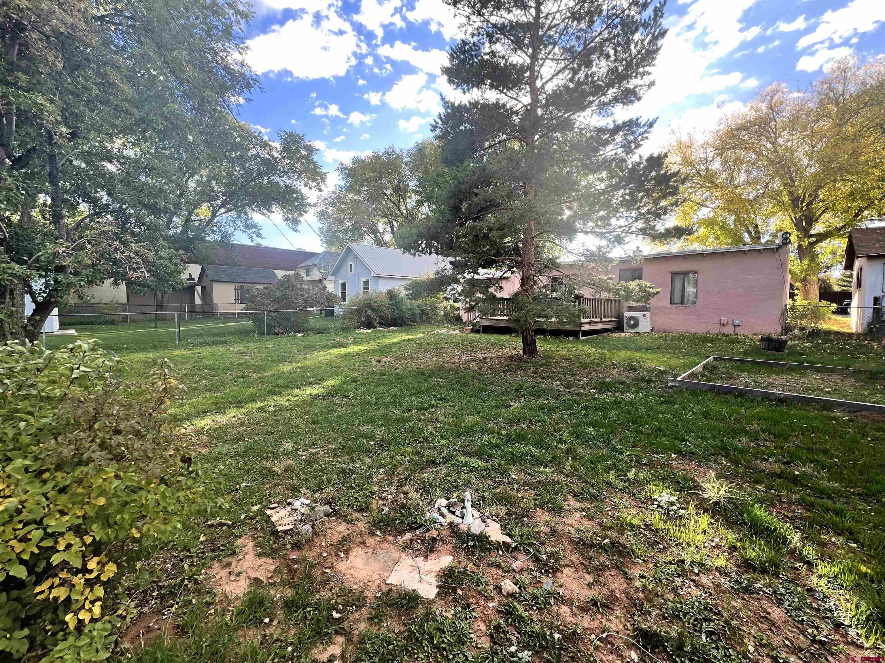 112 North Adams Street Cortez, CO 81321 - Photo 20 of 20 a view of a park with large trees