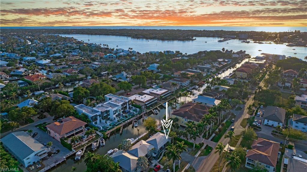 1560 Blue Point Avenue, Unit 3 Naples, FL 34102 - Photo 26 of 27 an aerial view of multiple house