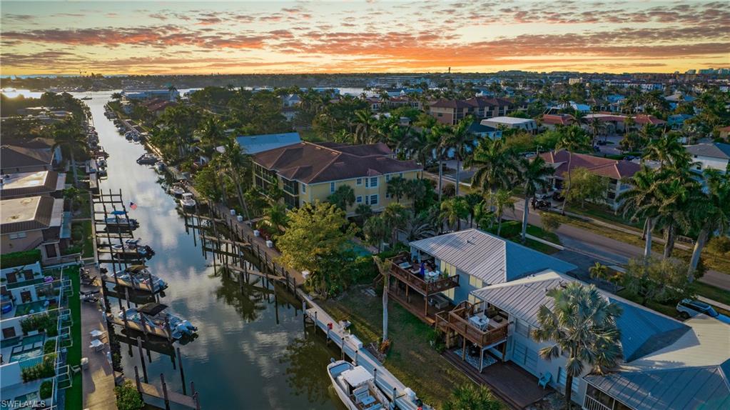 1560 Blue Point Avenue, Unit 3 Naples, FL 34102 - Photo 27 of 27 a view of city and mountain