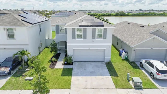 a aerial view of a house with garden