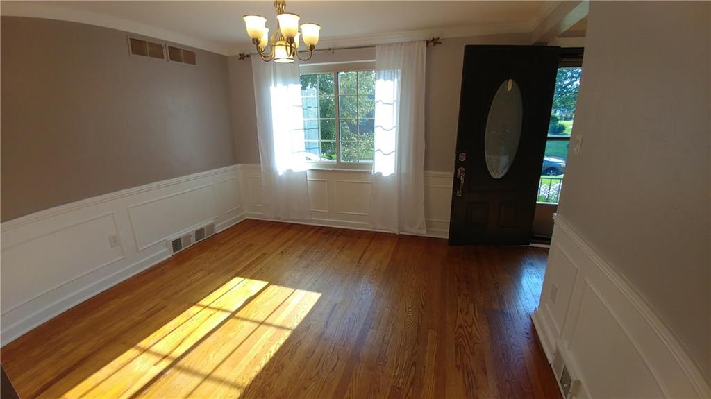 319 Rockhill Road Pittsburgh, PA 15243 - Photo 5 of 25 Opposite of the living room is the formal dining room, also boasting with light and oak hardwood floors.