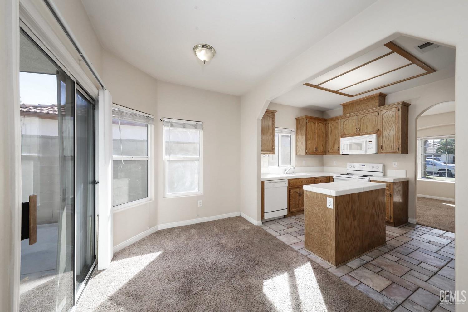 Undisclosed Address Bakersfield, CA 93312 - Photo 11 of 38 a view of a kitchen with a sink and cabinets