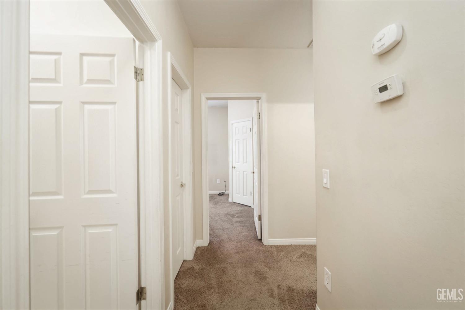 Undisclosed Address Bakersfield, CA 93312 - Photo 25 of 38 an empty room with windows