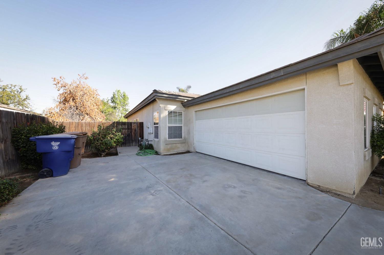 Undisclosed Address Bakersfield, CA 93312 - Photo 30 of 38 a view of a house with backyard