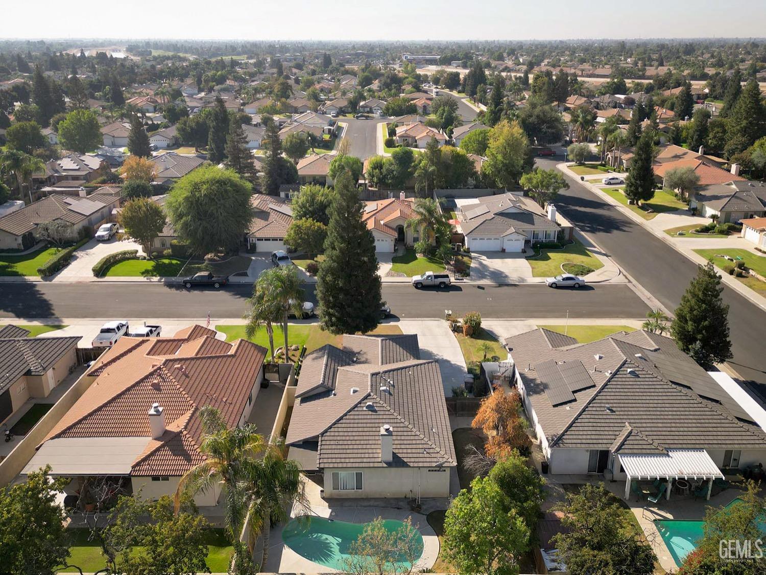 Undisclosed Address Bakersfield, CA 93312 - Photo 33 of 38 an aerial view of residential houses with outdoor space