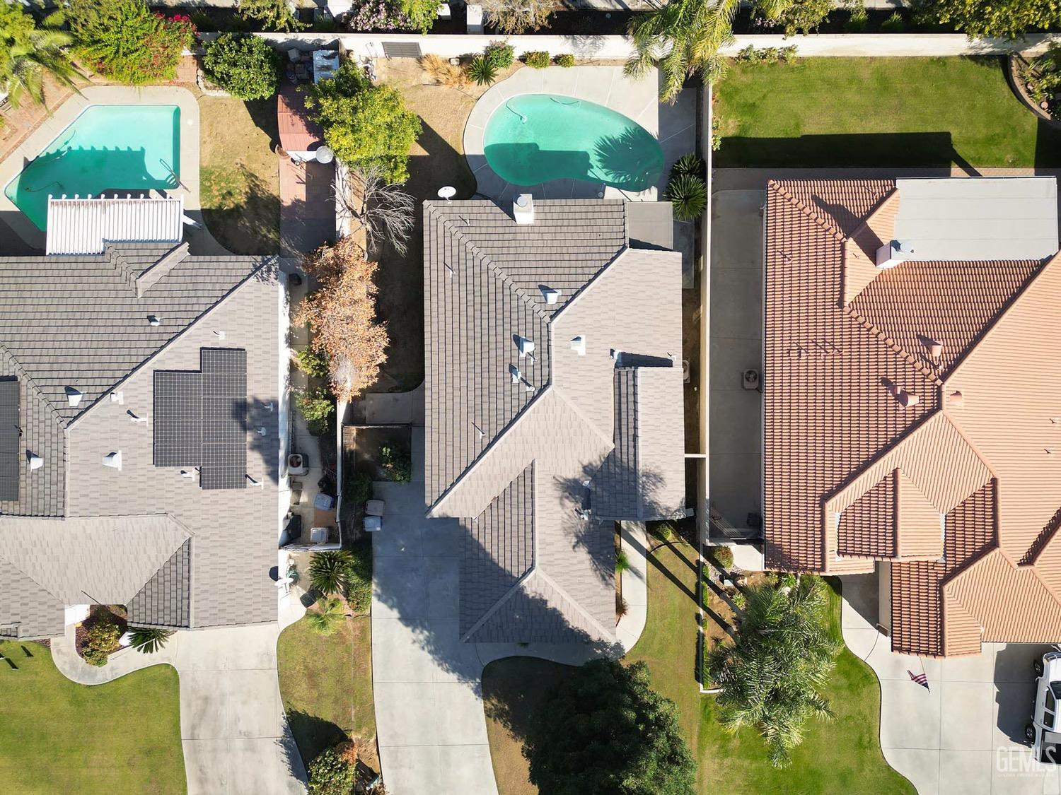 Undisclosed Address Bakersfield, CA 93312 - Photo 34 of 38 an aerial view of a house with a swimming pool