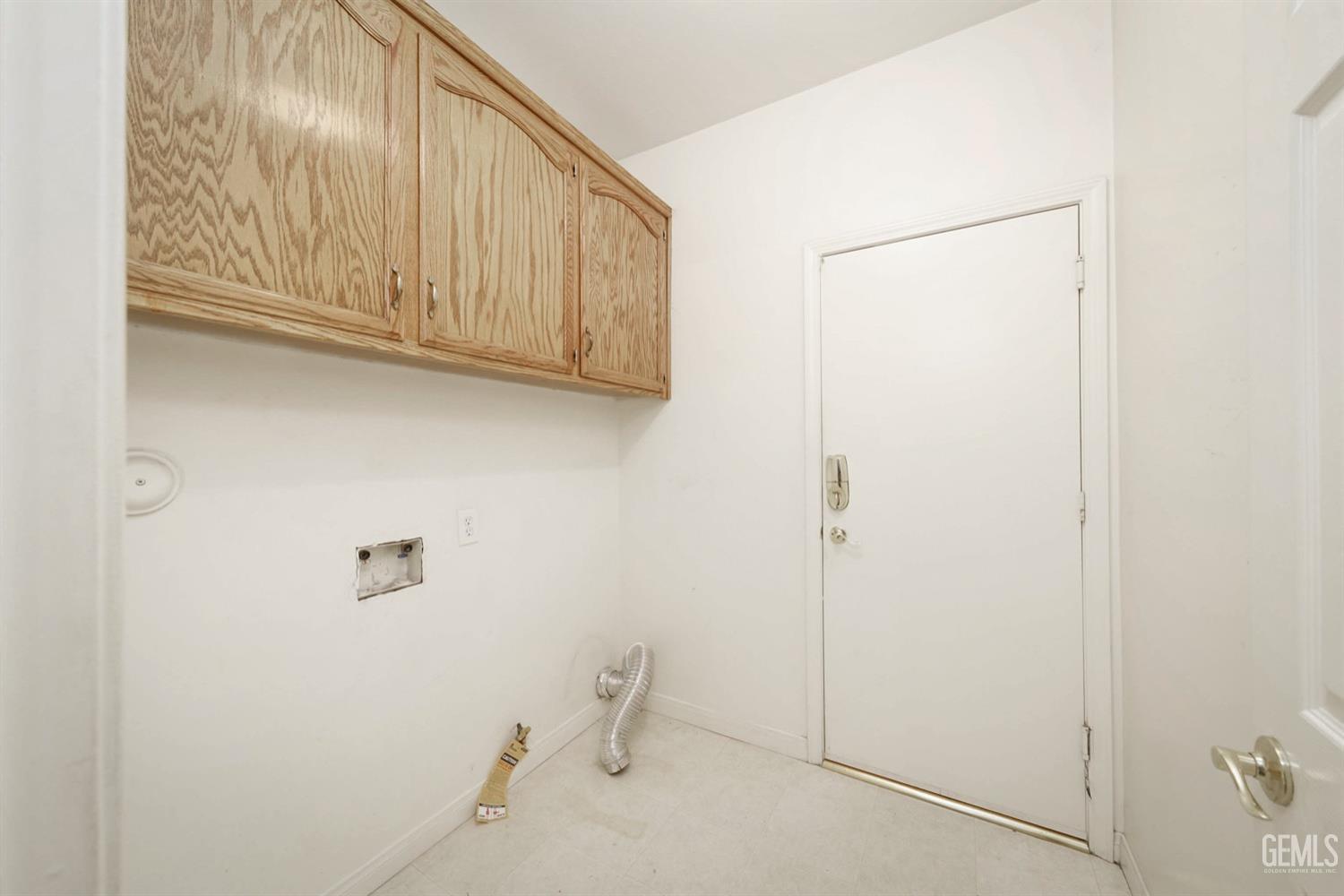 Undisclosed Address Bakersfield, CA 93312 - Photo 10 of 38 a bathroom with a shower and cabinets