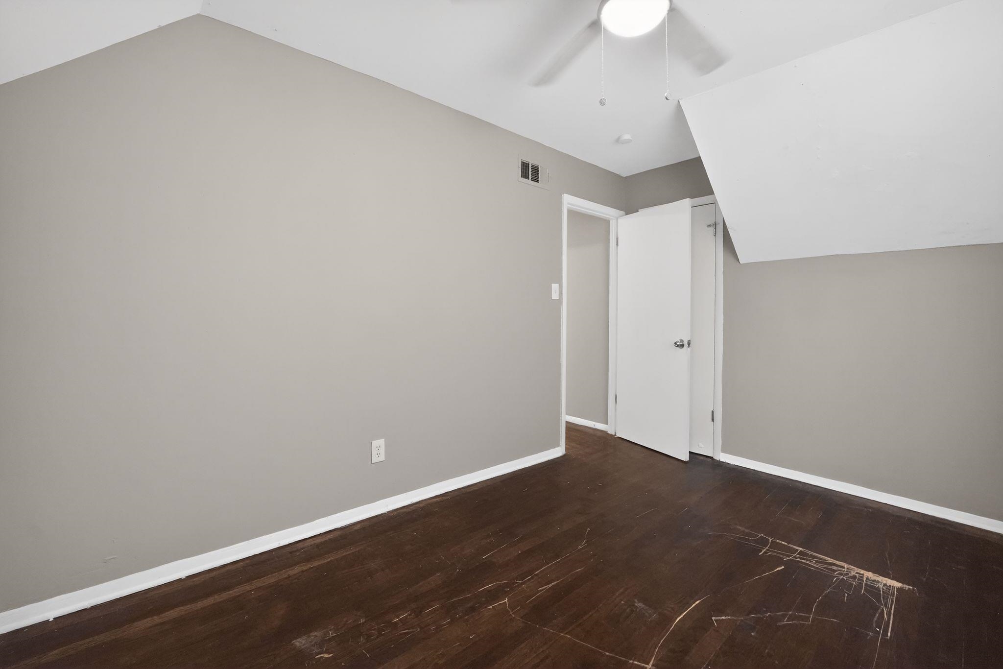 4646 Applegate Road Memphis, TN 38109 - Photo 25 of 37 a view of room with wooden floor