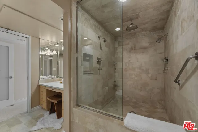 a bedroom with bed and window