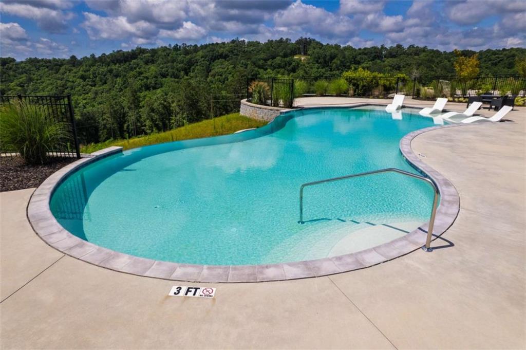285 Anglers Ridge Road Talking Rock, GA 30175 - Photo 24 of 31 a view of a swimming pool and a yard