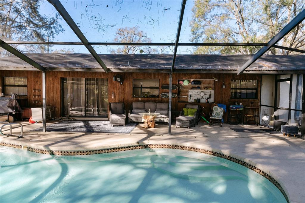 18305 Oakdale Road Odessa, FL 33556 - Photo 33 of 42 a view of a building with sitting area