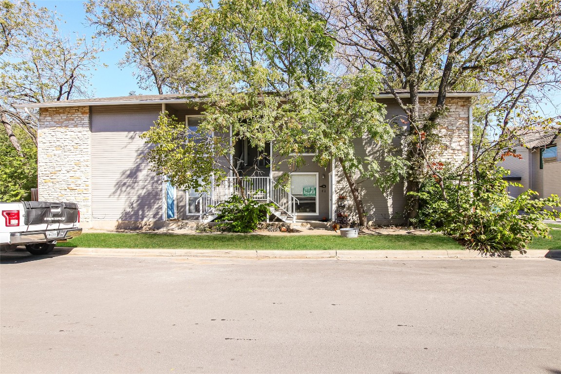 5201 Evans Avenue, Unit D Austin, TX 78751 - Photo 1 of 1 View of front facade with stone siding
