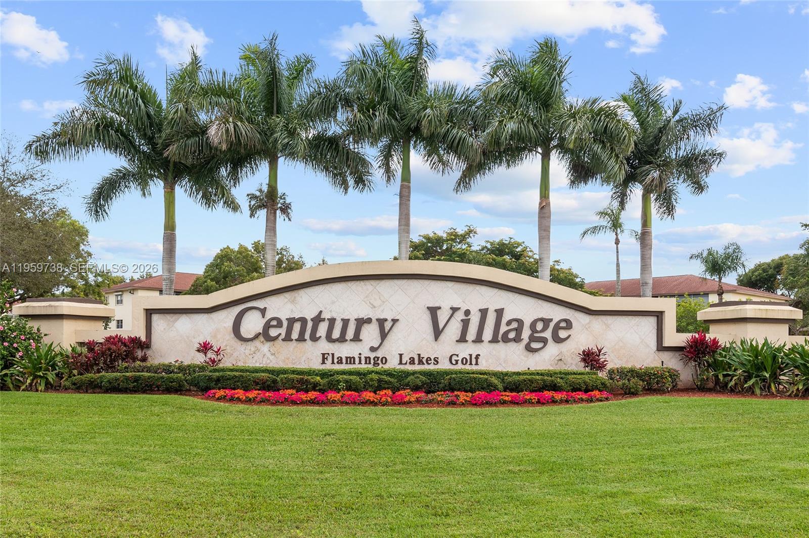 13475 Southwest 9th Street, Unit 407A Pembroke Pines, FL 33027 - Photo 1 of 15 a sign on the side of the building