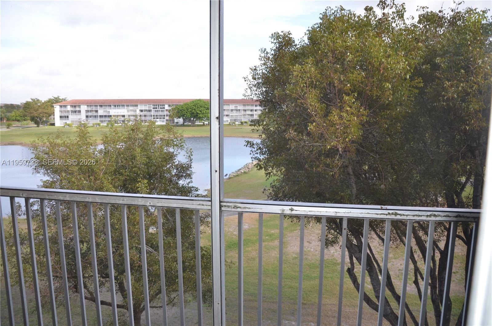 13475 Southwest 9th Street, Unit 407A Pembroke Pines, FL 33027 - Photo 2 of 15 a view of a balcony with outdoor space
