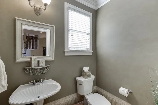 a kitchen with stainless steel appliances granite countertop a stove and a refrigerator
