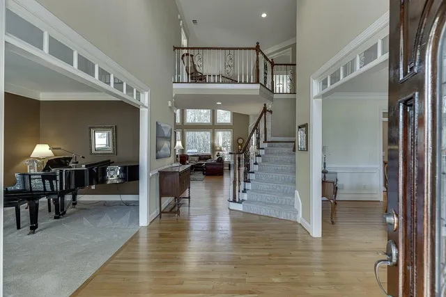 a living room with furniture and a table