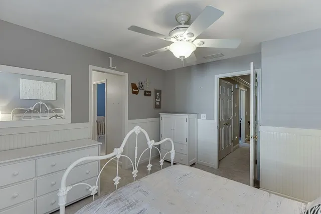 a large spacious bathroom with a large tub shower and sink