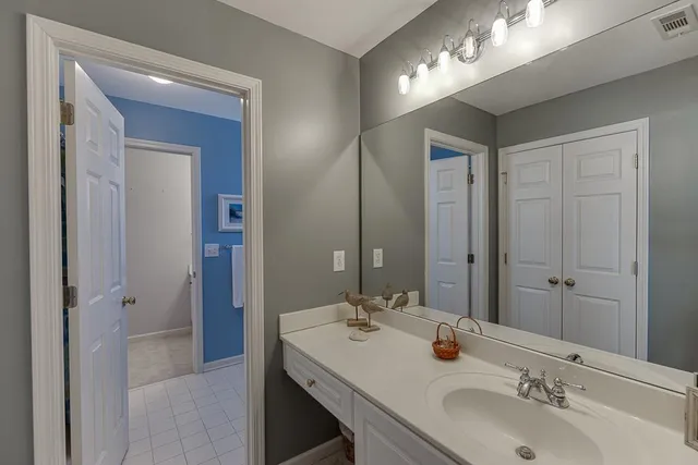 a kitchen with a table and chairs in it