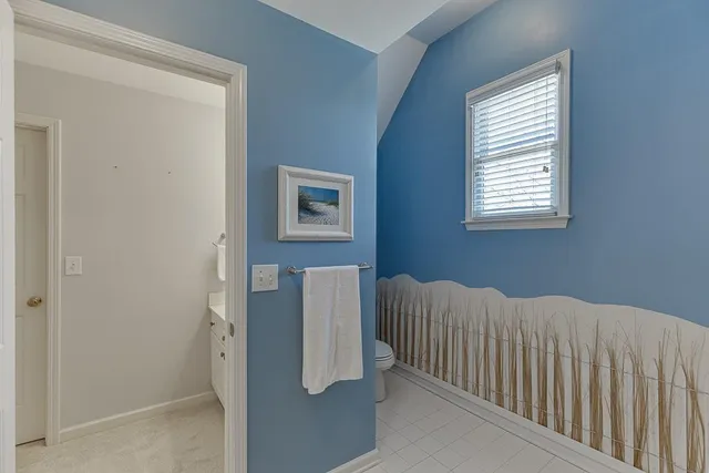 a kitchen with a table and chairs in it