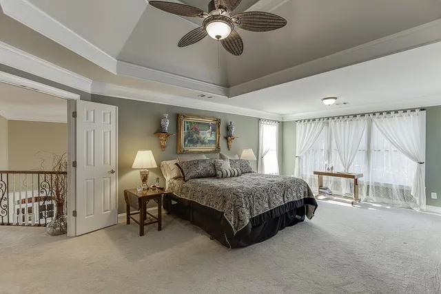 a bathroom with a toilet a sink and shower