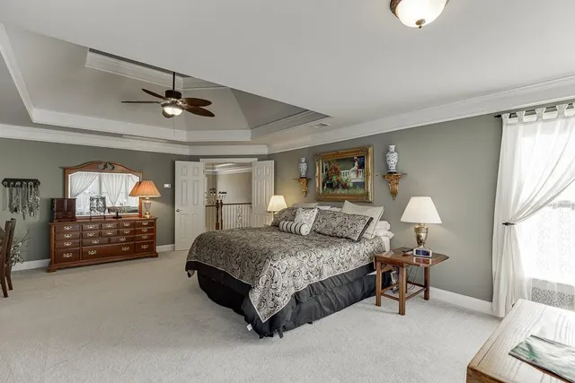 a view of a balcony with furniture and wooden floor