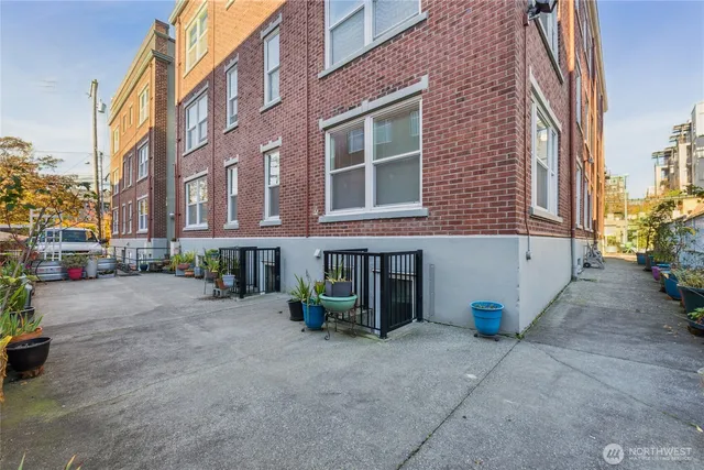 a view of a building with sitting area