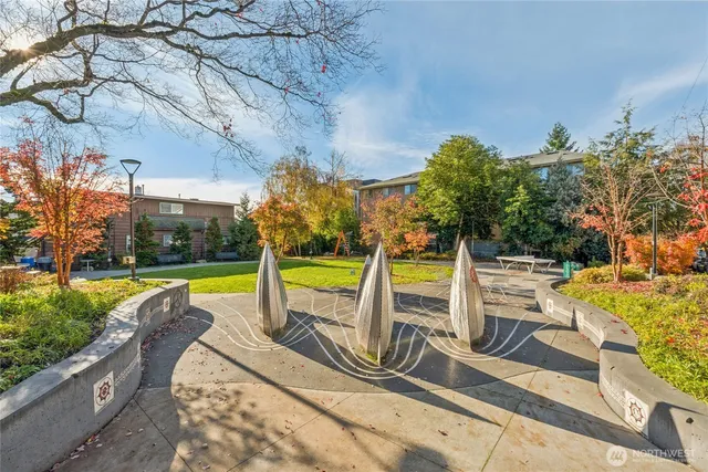 a view of a building with sitting area