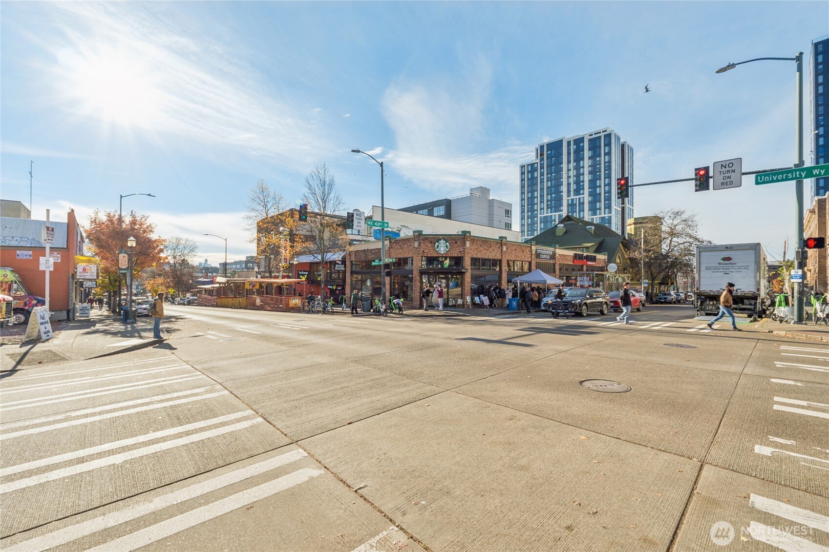 905 Northeast 43rd Street, Unit 108 Seattle, WA 98105 - Photo 26 of 28 a city view with lot of cars and parked