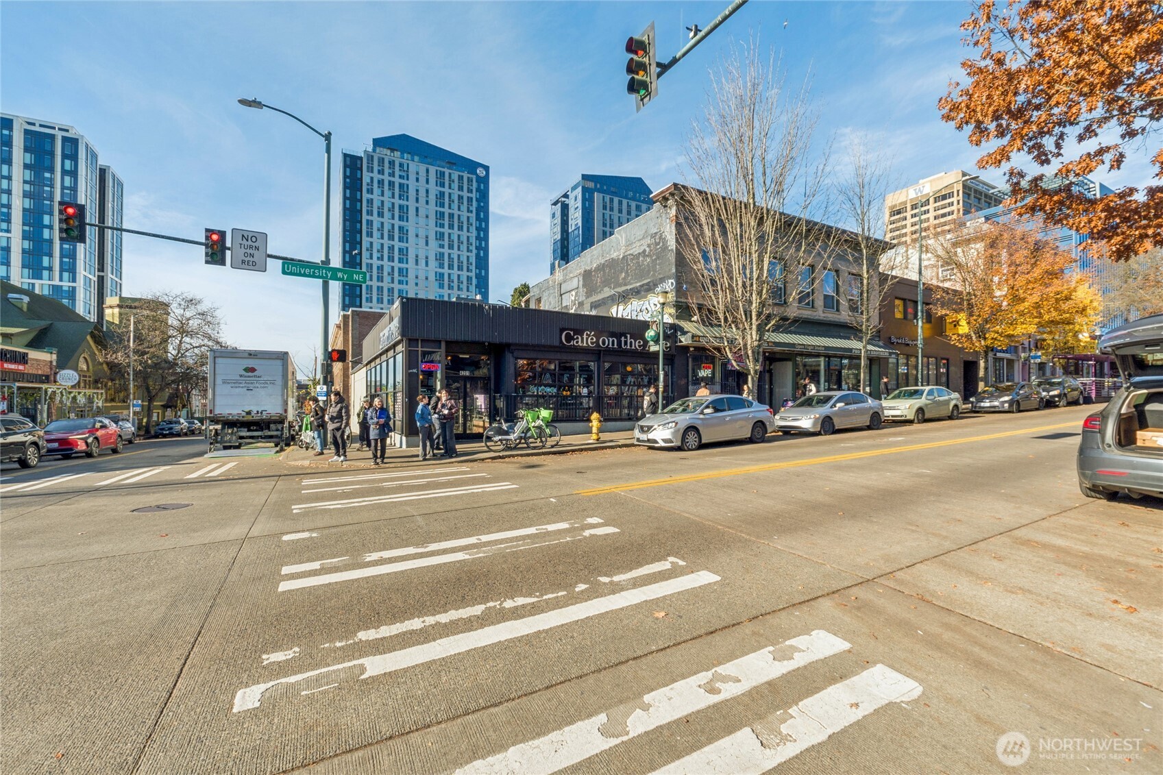 905 Northeast 43rd Street, Unit 108 Seattle, WA 98105 - Photo 27 of 28 a view of a street with cars