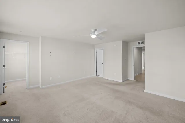 an empty room with a bathroom