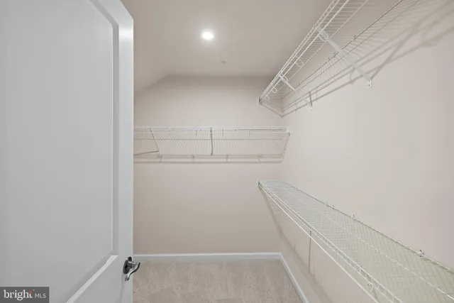 a view of a room with racks on the wall