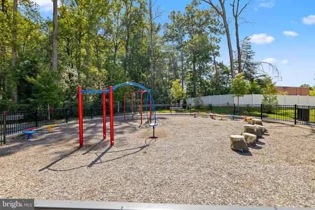a swimming pool with outdoor seating and yard