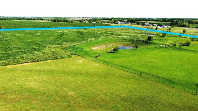 a view of a golf course with a lake