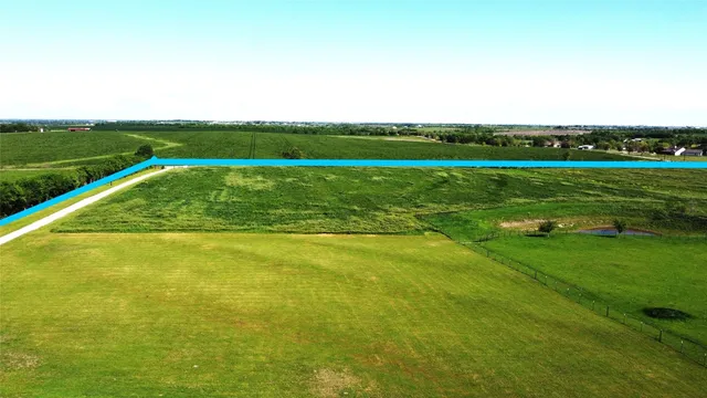 a view of a golf course with a lake