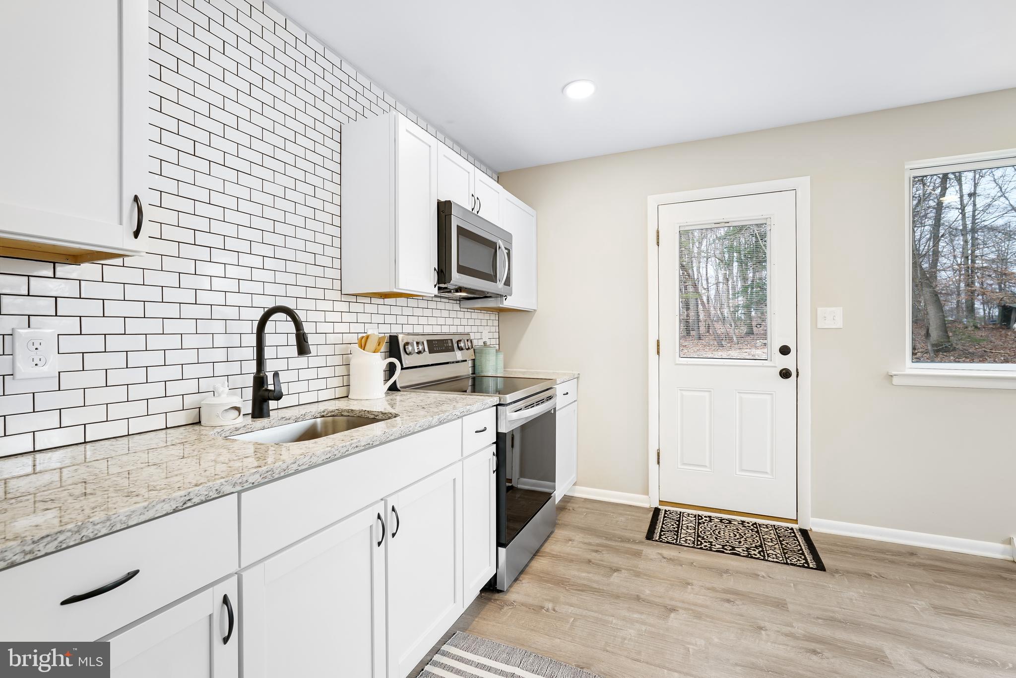 559 Principio Road Port Deposit, MD 21904 - Photo 11 of 33 Kitchen with exterior to rear deck