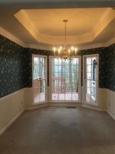 325 Rams Way Tucker, GA 30084 - Photo 3 of 12 a view of an empty room with a window