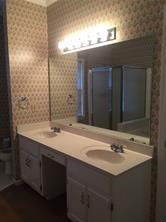 325 Rams Way Tucker, GA 30084 - Photo 6 of 12 a bathroom with a sink double vanity and a mirror