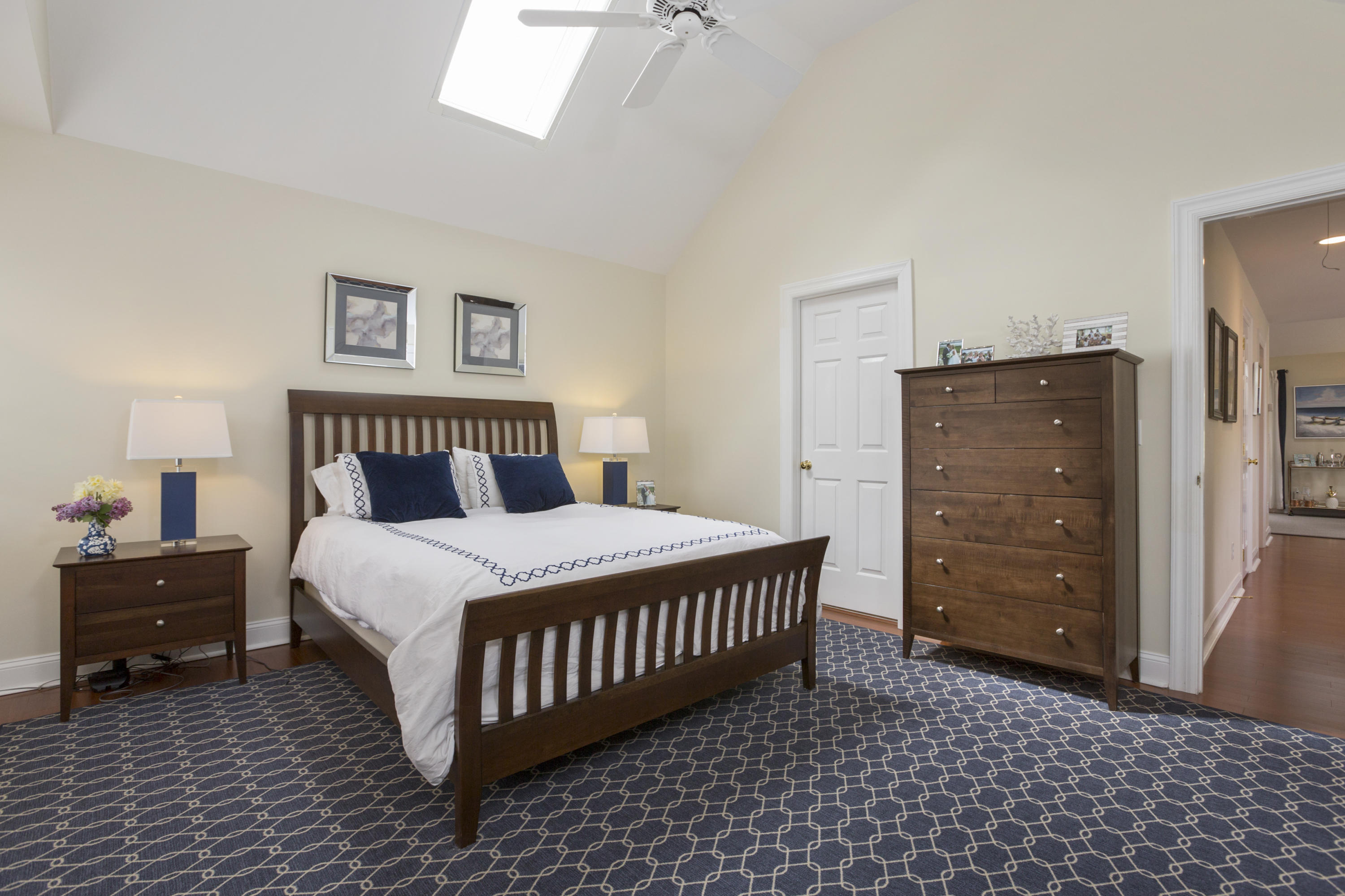 39 Hale Lane Darien, CT 06820 - Photo 12 of 19 a bedroom with a bed and a cabinets