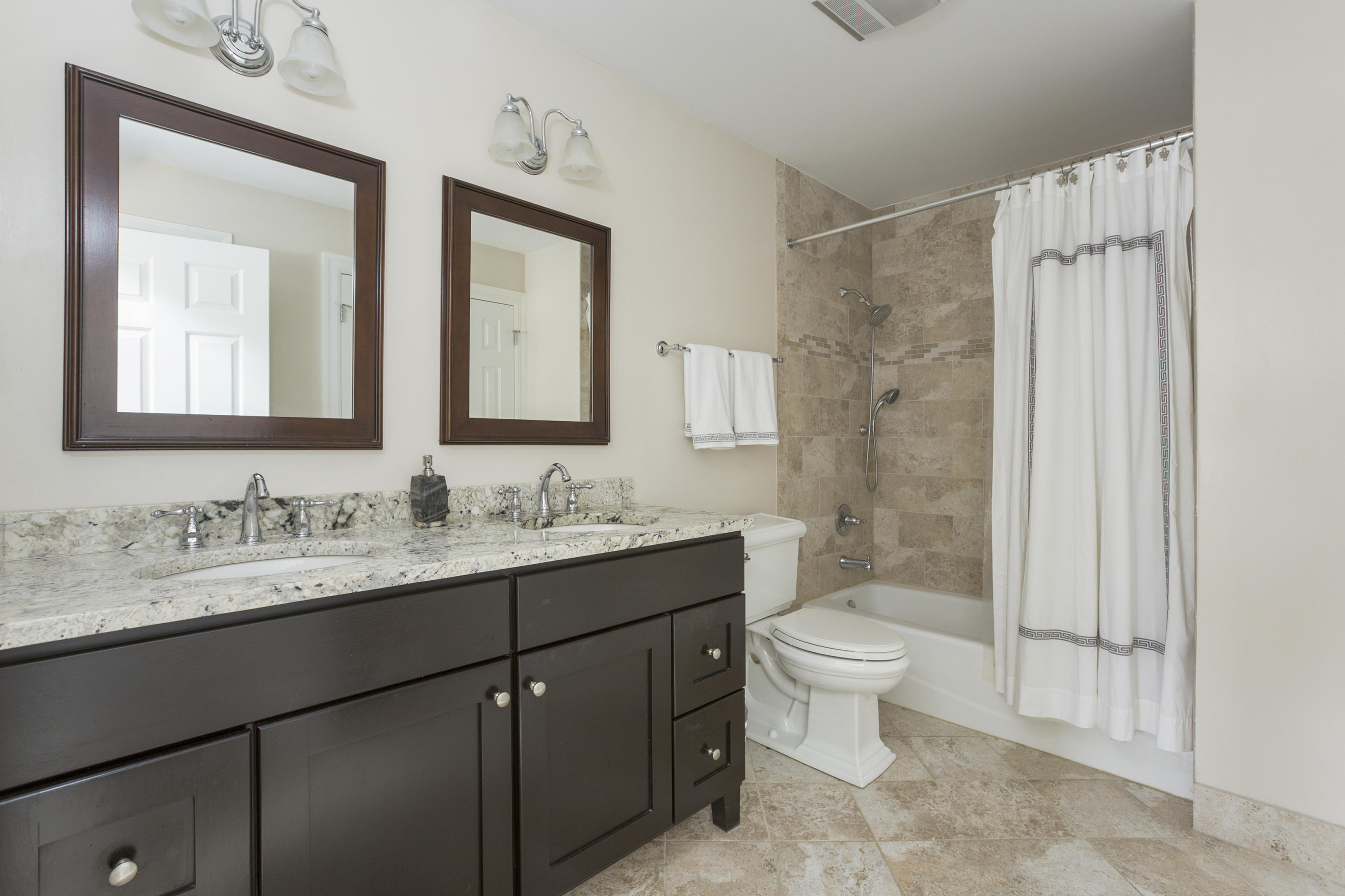 39 Hale Lane Darien, CT 06820 - Photo 14 of 19 a bathroom with a toilet sink and mirror