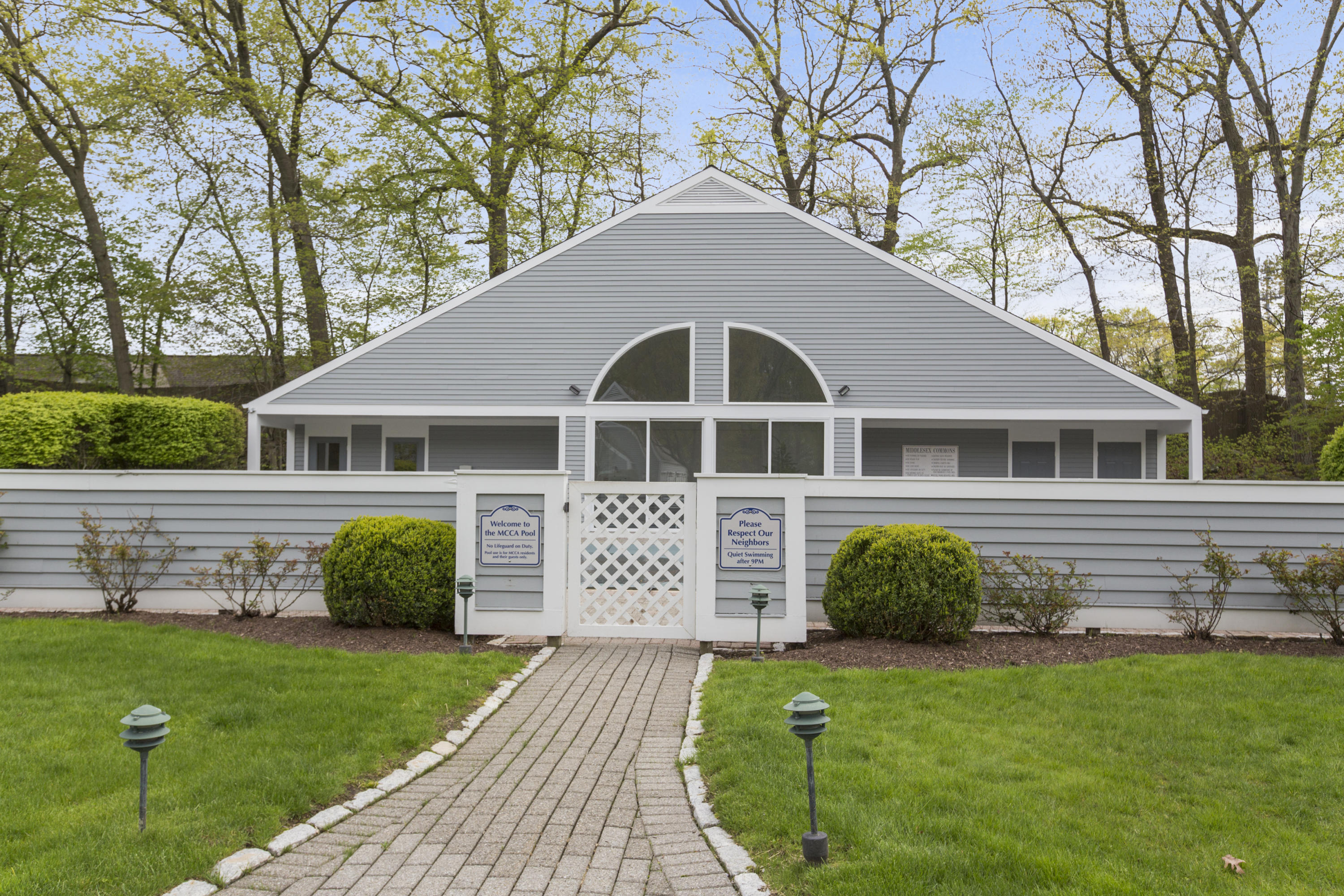 39 Hale Lane Darien, CT 06820 - Photo 16 of 19 a front view of a house with a yard