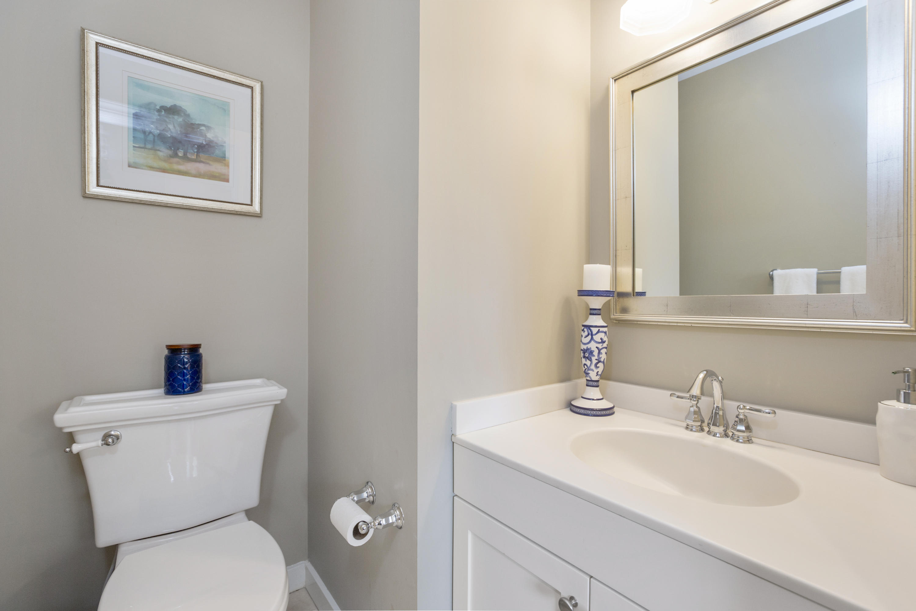 39 Hale Lane Darien, CT 06820 - Photo 10 of 19 a bathroom with a toilet sink and mirror