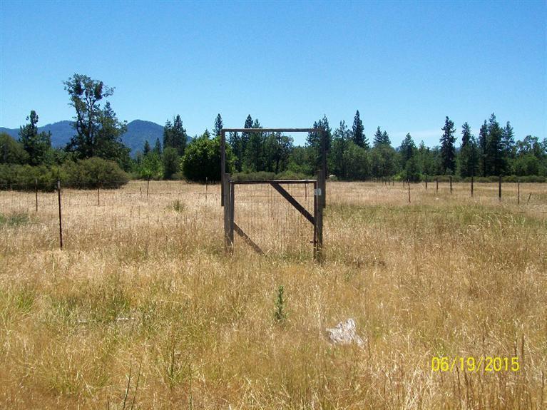 4271 Rockydale Road Cave Junction, OR 97523 - Photo 26 of 35 Huge garden area, still fenced. Gate is