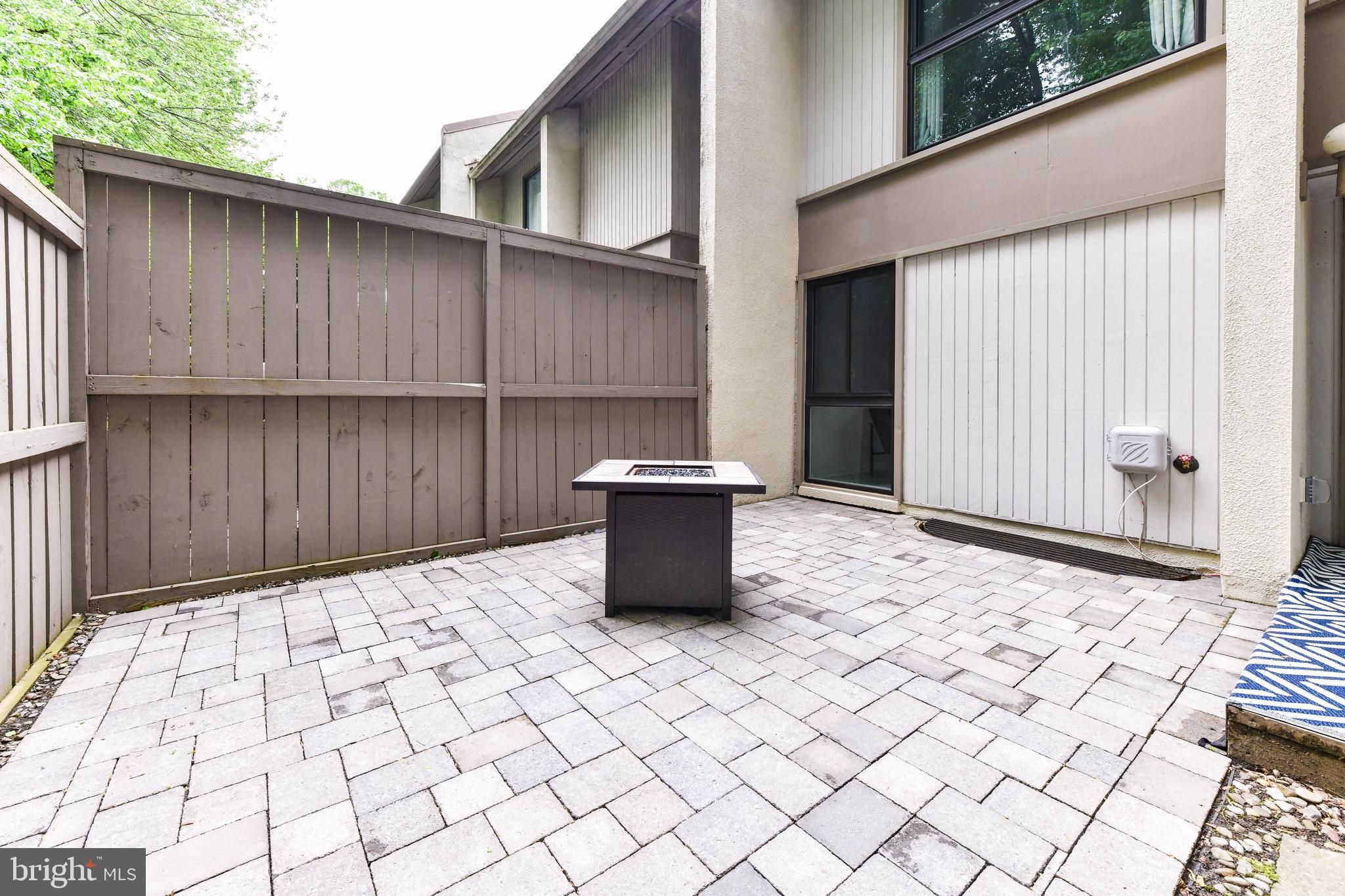 11701 Newbridge Court Reston, VA 20191 - Photo 44 of 64 New stone patio, great for fire pit or play area!
