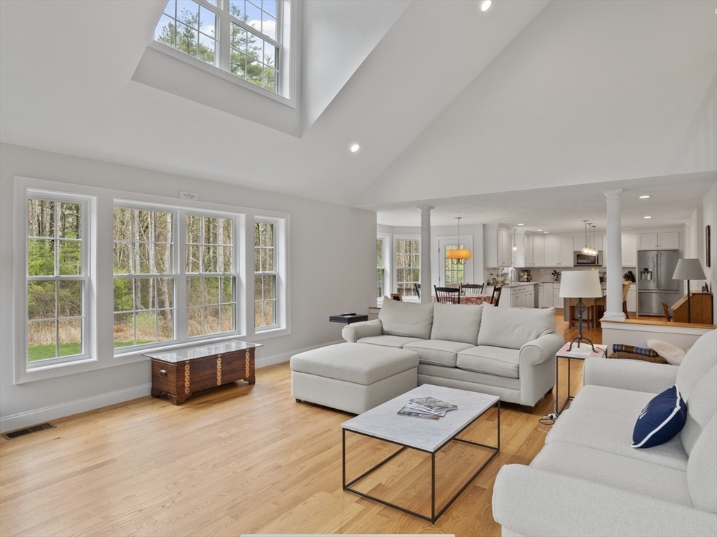3 Pond Circle Pepperell, MA 01463 - Photo 14 of 33 a living room with furniture and a large window
