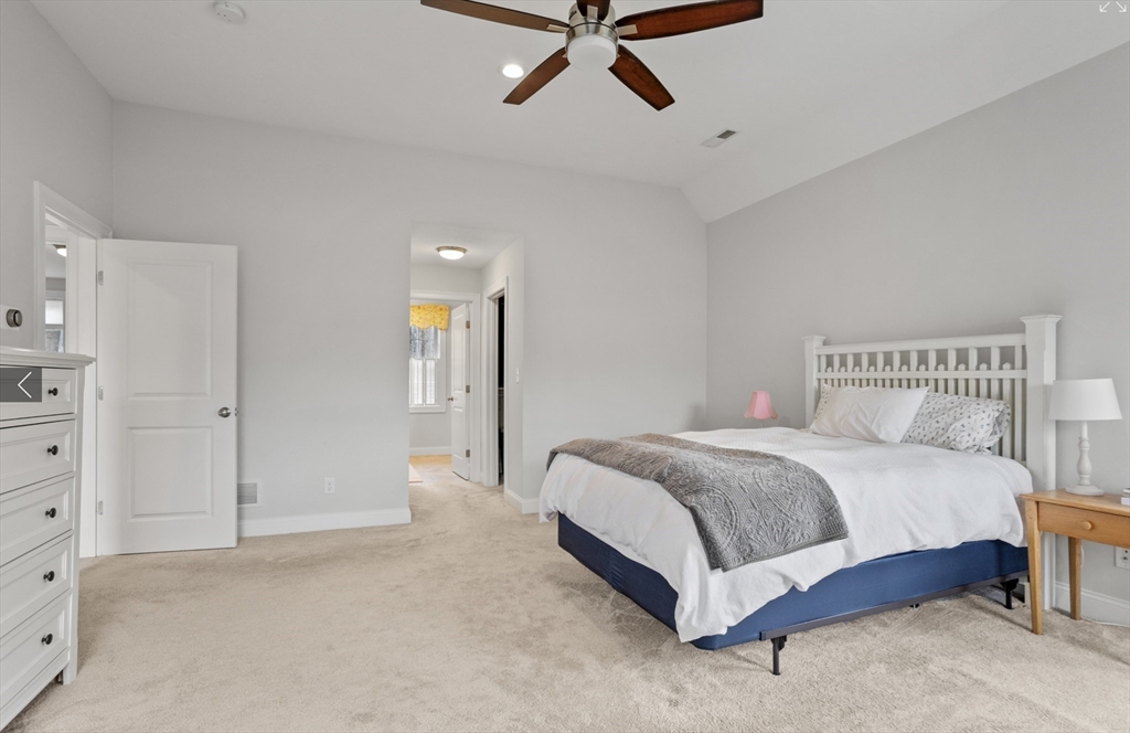 3 Pond Circle Pepperell, MA 01463 - Photo 21 of 33 a spacious bedroom with a bed and cabinet