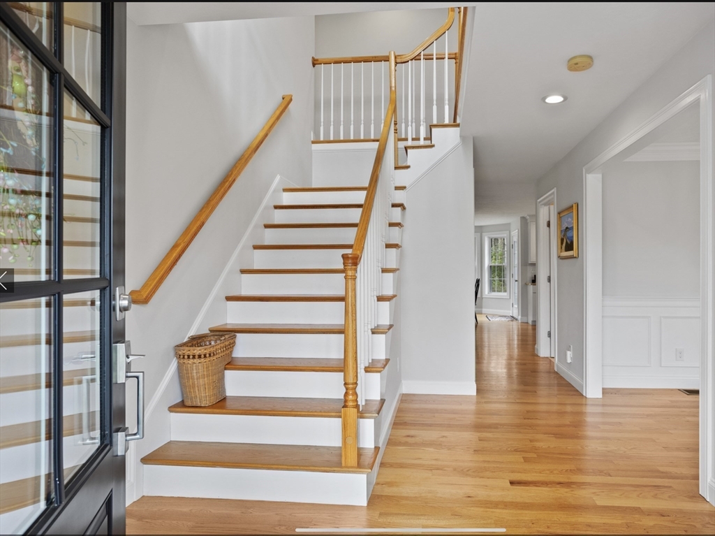 3 Pond Circle Pepperell, MA 01463 - Photo 6 of 33 a view of entryway and hall with wooden floor