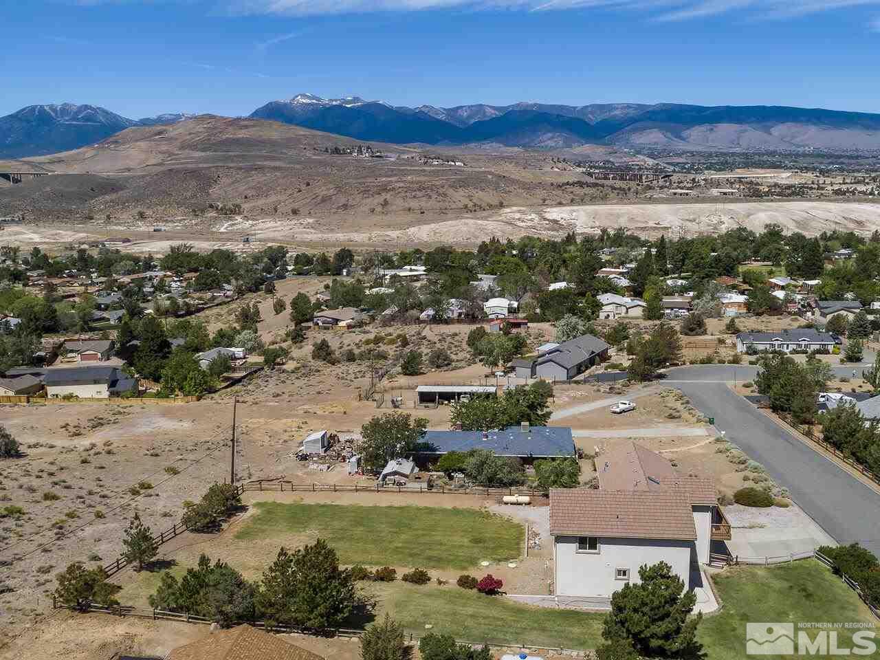 1090 Reese Way Reno, NV 89521 - Photo 11 of 33 an aerial view of residential building and ocean